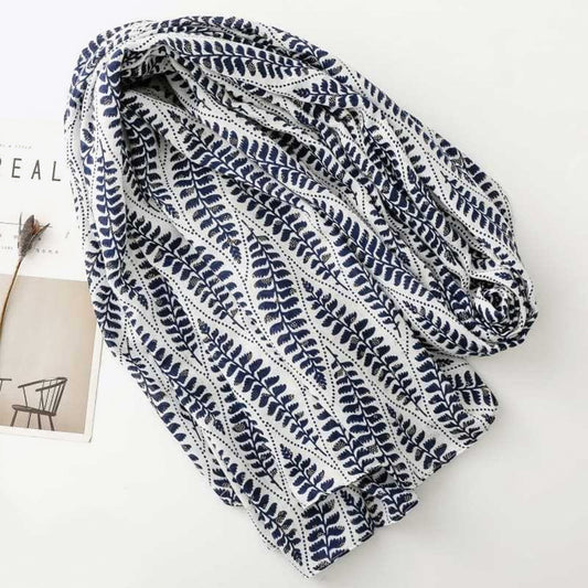 Gold-printed palm leaf tassel silk scarf