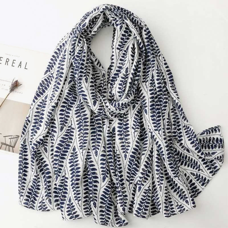 Gold-printed palm leaf tassel silk scarf