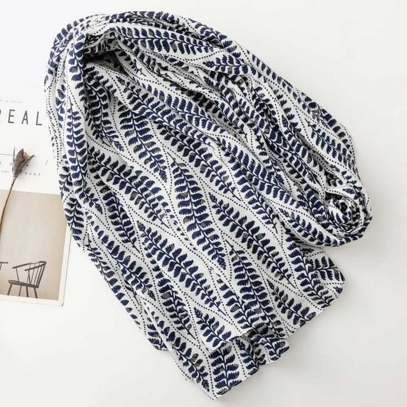 Gold-printed palm leaf tassel silk scarf