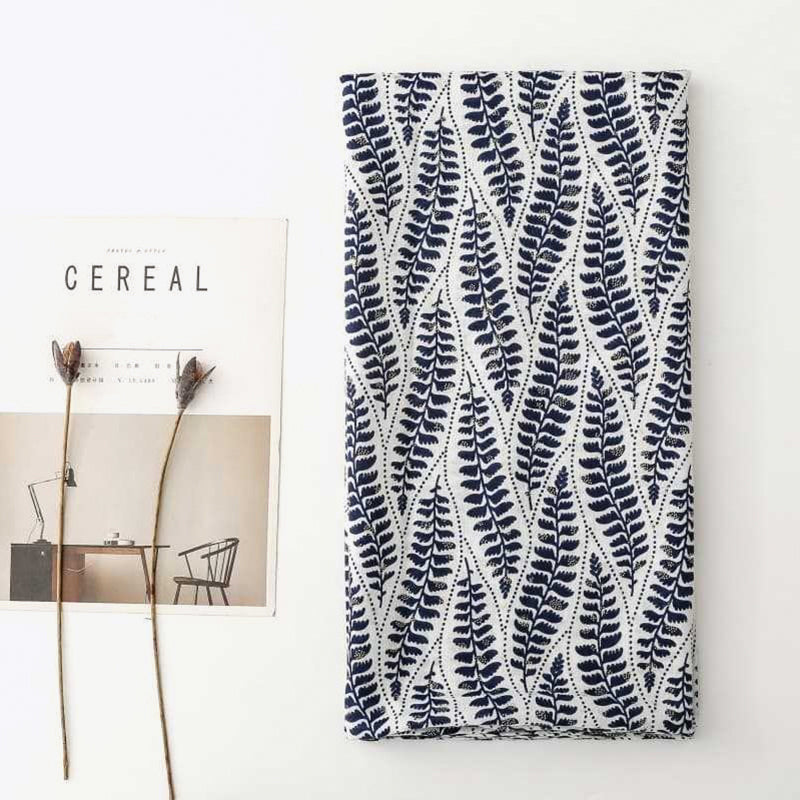 Gold-printed palm leaf tassel silk scarf